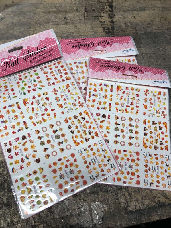 Photo 2 of 12 Sheets Fall Nail Art Stickers Autumn Nail Art Water Transfer Nail Decals Maple Leaf Nail Art Supplies Fall Leaves Turkey Pumpkin Design Stickers for Women Acrylic Nail Art Thanksgiving Decorations Pack of 23