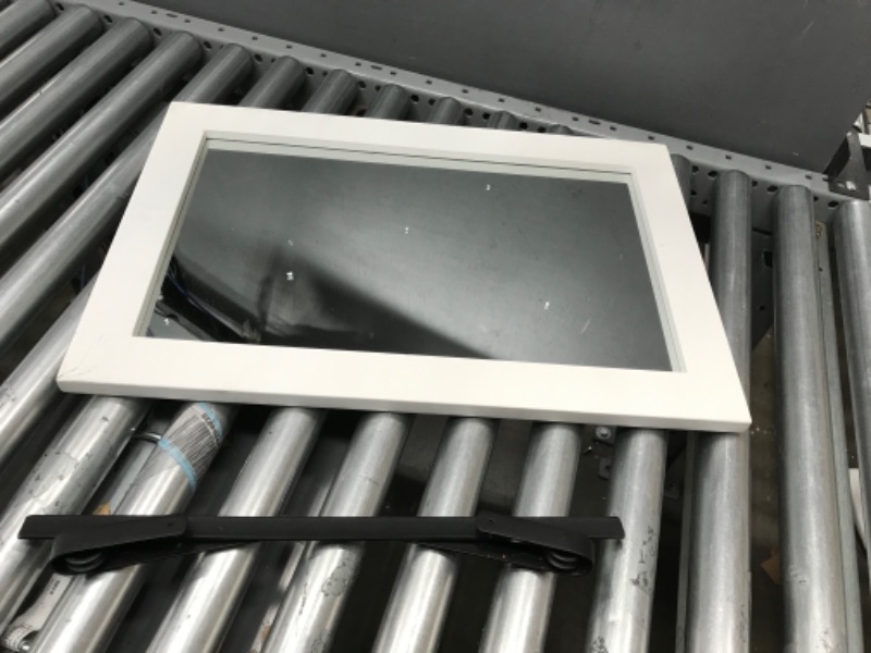 Photo 1 of  Make/model unknown rectangle hanging mirror with removeable back