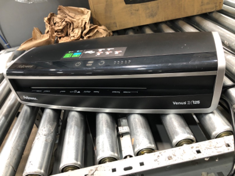 Photo 2 of **USED**
Fellowes Laminator Venus 2 125, Rapid 30-60 Second Warm-up Laminating Machine, with Laminating Pouches Kit (5734801), Black, Silver, 5.1" x 21.3" x 8.2" & 52042 Glossy Pouches - Letter 10 mil 50 Pack Venus Laminator + Laminating Pouches, 50 Pack