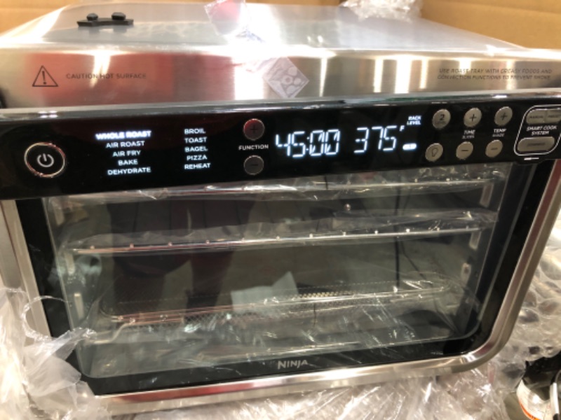 Photo 4 of **DAMAGED** Ninja DT251 Foodi 10-in-1 Smart XL Air Fry Oven, Bake, Broil, Toast, Air Fry, Roast, Digital Toaster, Smart Thermometer, True Surround Convection up to 450°F, includes 6 trays & Recipe Guide, Silver Stainless Steel Finish Convection Toaster Ov