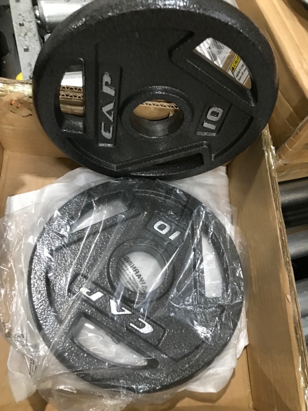 Photo 1 of ****2 MISSING ****
Cap Olympic Grip Weight Plate Collection 10 lb, Set of 4,Black