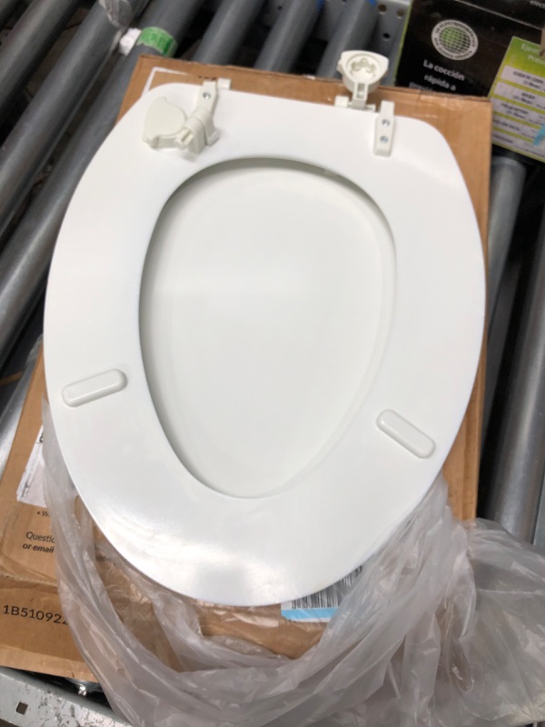 Photo 3 of **BROKEN***
Mayfair Molded Wood Toilet Seat with Easy-Clean & Change Hinges, Elongated, White, 144ECA 000 1 Pack Elongated Toilet Seat