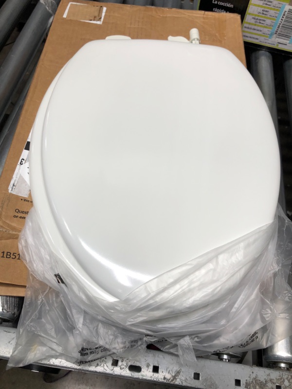 Photo 7 of **BROKEN***
Mayfair Molded Wood Toilet Seat with Easy-Clean & Change Hinges, Elongated, White, 144ECA 000 1 Pack Elongated Toilet Seat