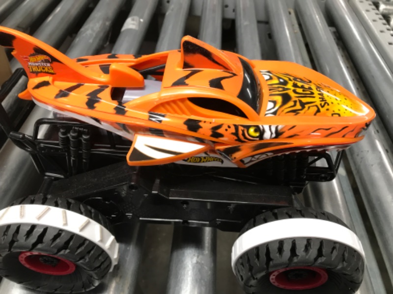 Photo 2 of Hot Wheels Monster Trucks, Remote Control Car, Monster Truck Toy with All-Terrain Wheels, 1:15 Scale Unstoppable Tiger Shark RC