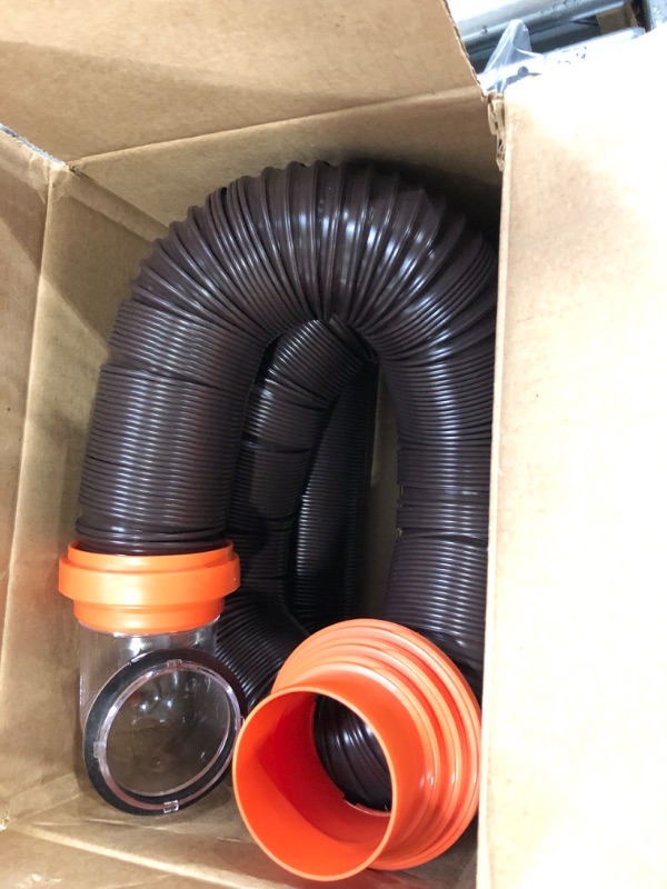 Photo 2 of Camco RhinoFLEX RV Sewer Hose Kit with Swivel Transparent Elbow and 4-in-1 Dump Station Fitting, Brown, 15 Feet (39770) 15ft Sewer Hose Kit Frustration-Free Packaging