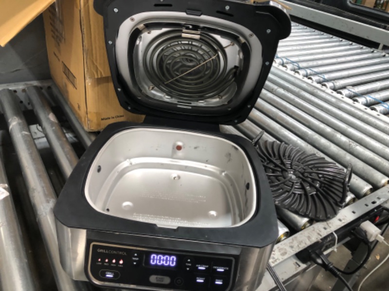 Photo 2 of ***NOT WORKING***SOLD FOR PARTS ONLY****
Ninja AG301 Foodi 5-in-1 Indoor Grill with Air Fry, Roast, Bake & Dehydrate, Black/Silver
