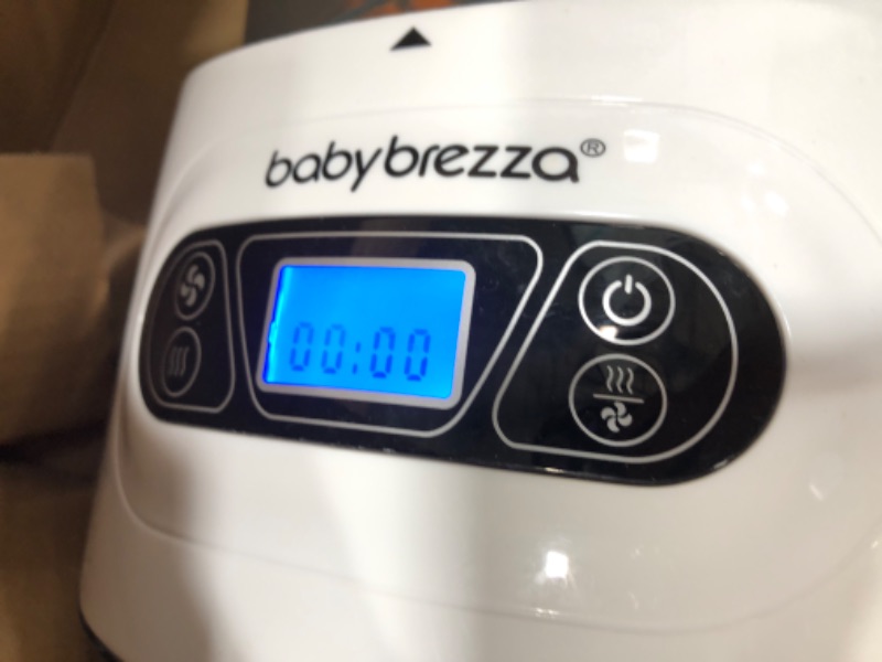 Photo 4 of Baby Brezza Baby Bottle Sterilizer and Dryer Machine – Electric Steam Sterilization - Universal Fit - Pacifiers, Glass, Plastic, and Newborn Feeding Bottles