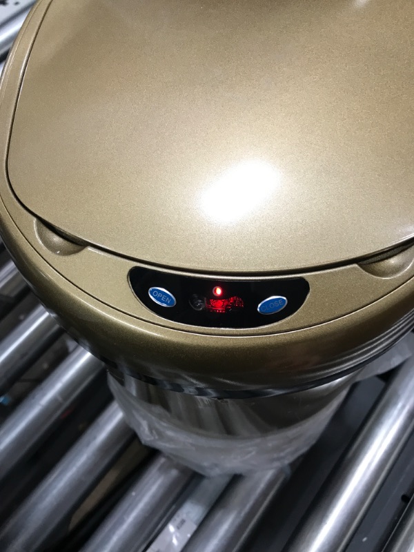 Photo 3 of ***Small dent due to prior use.***
Smart Trash Can 3.5 Gallon Stainless Steel Garbage Can with Automatic Packaging Function, Touchless Trash Can, Intelligent Induction Trash Bin for for Bathroom Kitchen Office(Champagne Gold)