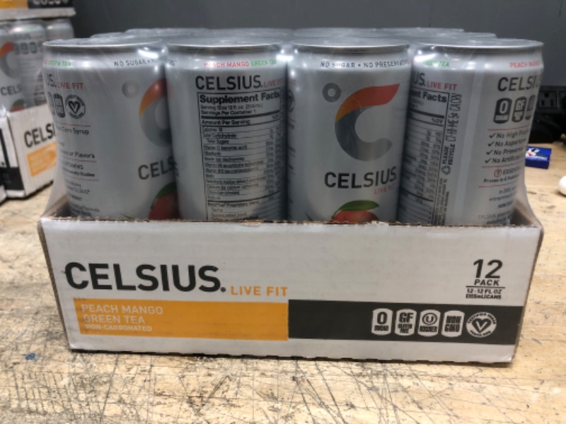 Photo 2 of (BESY BY: 04/24)  CELSIUS Essential Energy Drink 12 Fl Oz, Peach Mango Green Tea (Pack of 12)
