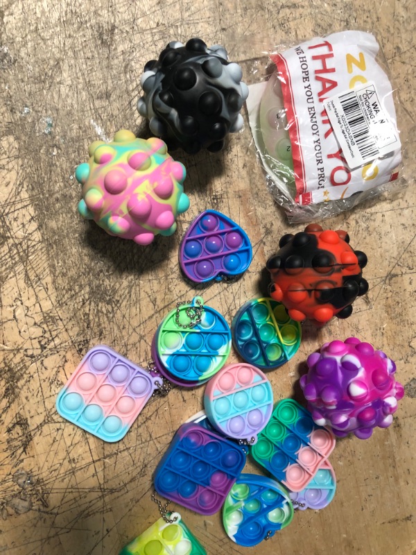 Photo 1 of BUNDLE OF ASSORTED FIDGET TOYS 