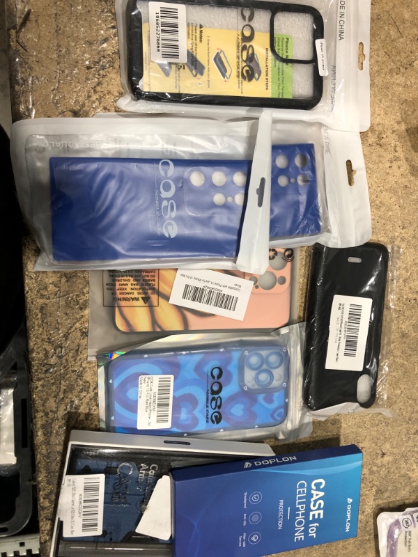 Photo 1 of bundle of assorted phone cases
