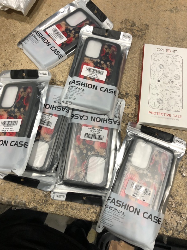 Photo 1 of bundle of assorted phone cases
