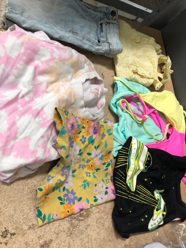 Photo 1 of BUNDLE OF ASSORTED FEMALE CLOTHING
