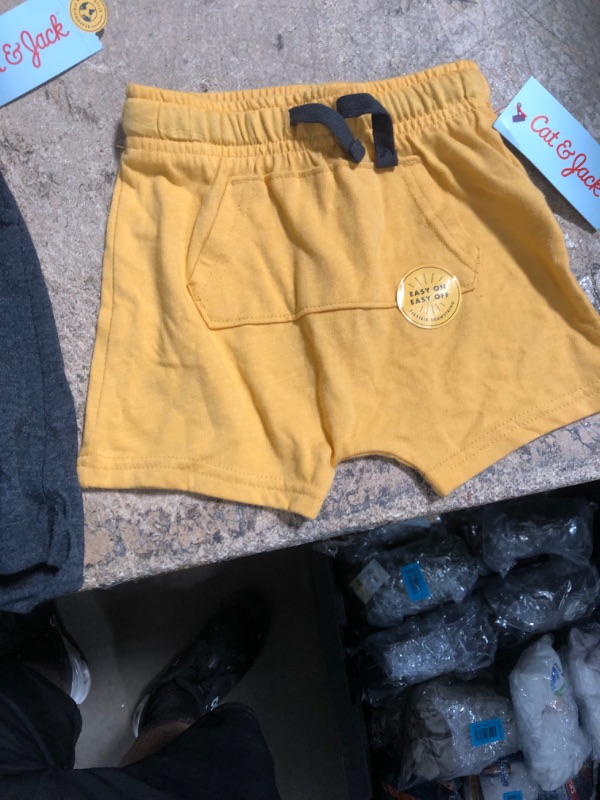 Photo 1 of 2 Assorted Kid Clothes (5T pants) (18m shorts) 