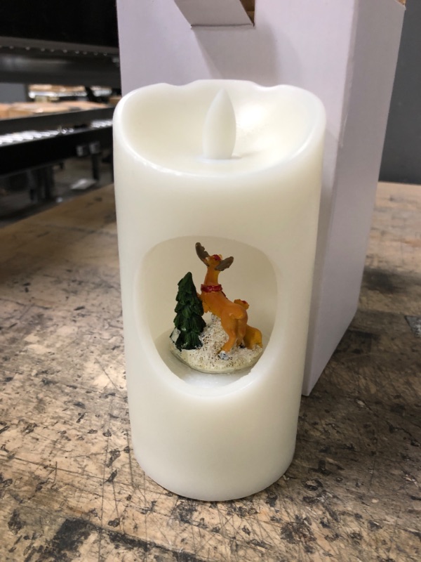 Photo 2 of (1 CANDLE) Valentines Day Holiday Flameless Candle with Rotating Display Stand and Jingle Bells Music Box Real Wax with Battery Operated LED Pillar Candle Christmas Holiday Gift, 3 x 6 Inches(Deer)