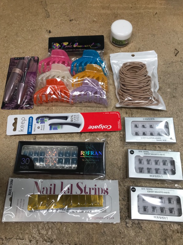 Photo 1 of Assortment of cosmetic items for hair, fascal, eye-lash, toothbrush refills, nails, etc. 