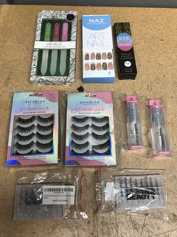 Photo 1 of Assortment of beauty products, nails and eyelashes. 