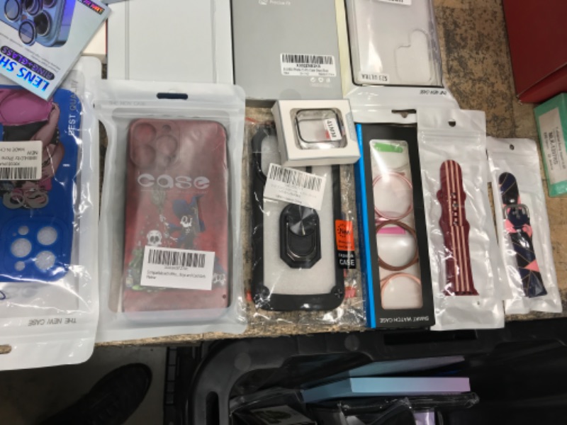 Photo 1 of Grab Bag Bundle of Mixed phone cases and Accessories. Wrist bands, watch Screen protectors. 25 item count. Iphone / Galaxy / Samsung watch case / lens protectors. 