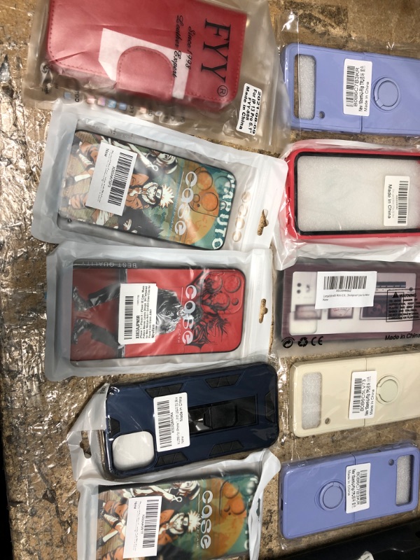 Photo 1 of bundle of assorted 10 phone cases 