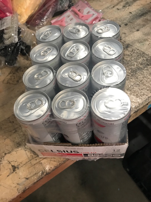 Photo 1 of *5/2024* CELSIUS Raspberry Acai Green Tea, Functional Essential Energy Drink 12 Fl Oz (Pack of 12) Raspberry Acai Green Tea 12 Fl Oz (Pack of 12)
