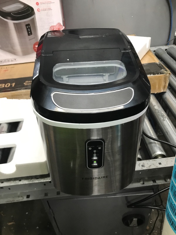 Photo 1 of **POWERS ON** **USED** **SHOCK PHOTO REFERENCE ONLY**
Frigidaire Counter Top Ice Maker
