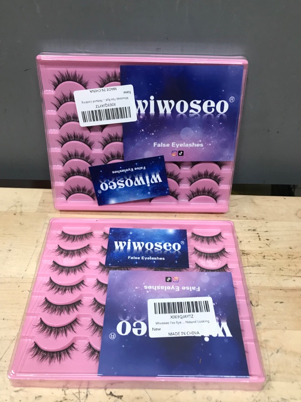 Photo 1 of wiwoseo False Eyelashes Natural Wispy Fluffy Cat Eye Lashes 16MM Faux Mink Lashes Crossed Strip Eye Lashes 14 Pairs Pack