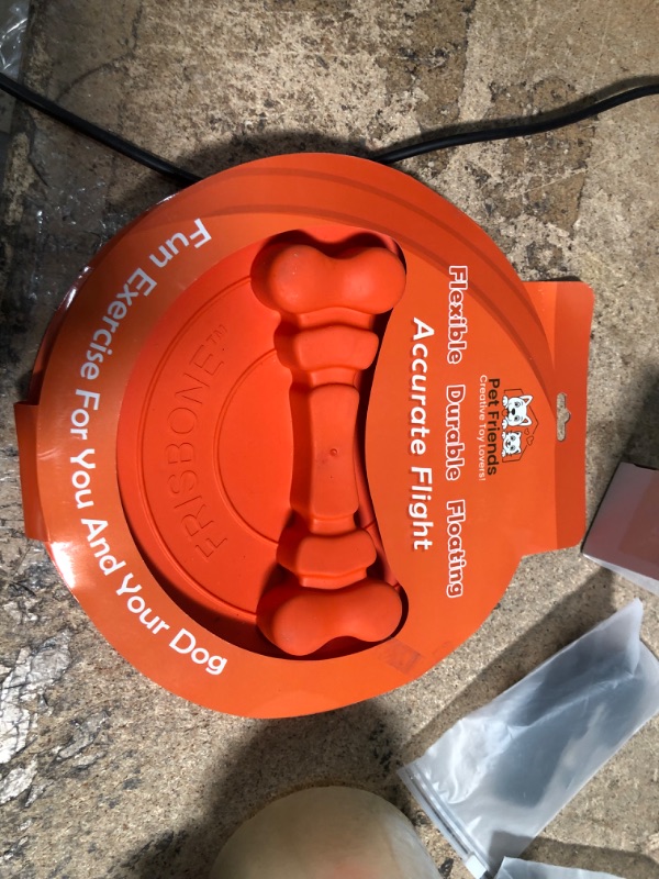Photo 1 of ORANGE DOG FRISBEE