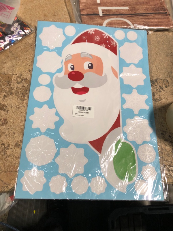 Photo 1 of Ergou Youth Christmas Snowflake Window Cling Stickers White Snowflake Window Decals-Snowflake Window Clings for Santa Reindeer Christmas Window Clings Decorations 274 PCS(6 Sheets), 11x17in