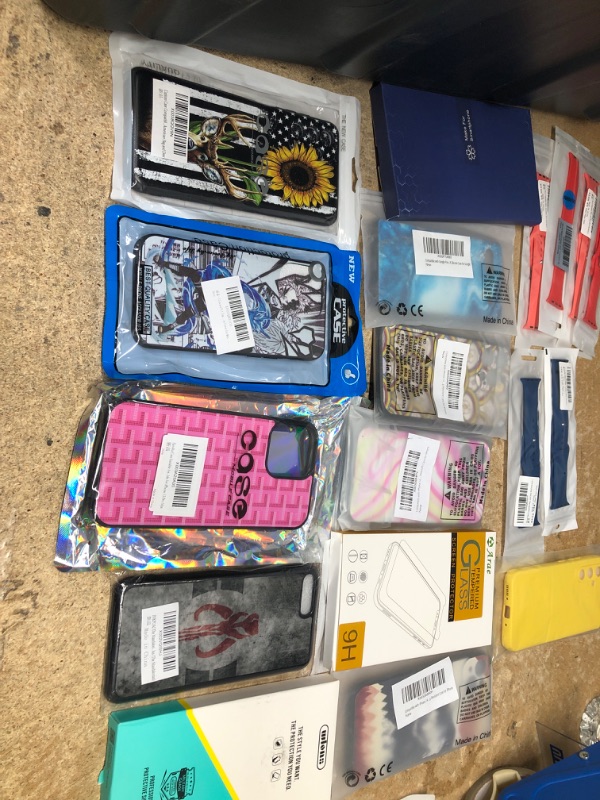 Photo 1 of MISCELLANEOUS BUNDLE OF ASSORTED PHONE CASES AND APPLE BANDS