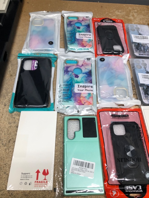 Photo 1 of MISCELLANEOUS BUNDLE OF ASSORTED PHONE CASES AND OTHER ELECTRICAL GOODS