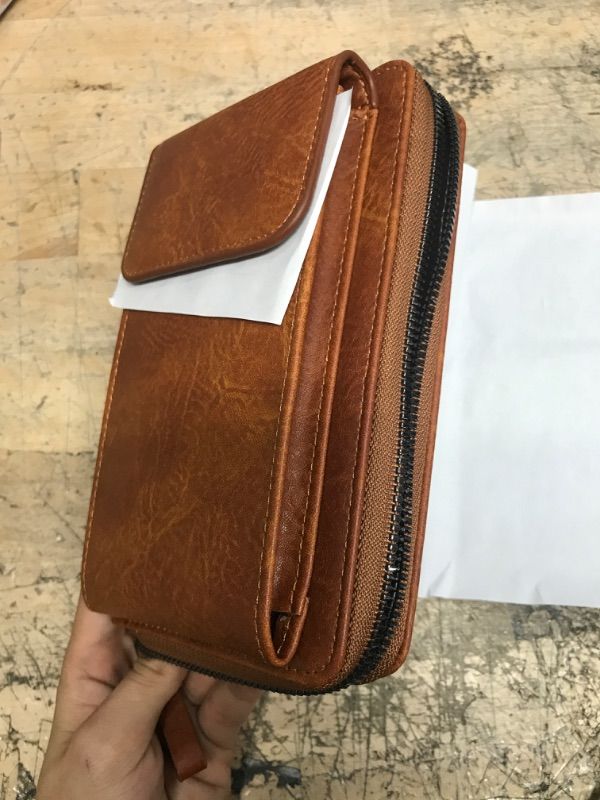 Photo 1 of Crossbody brown leather phone wallet bag