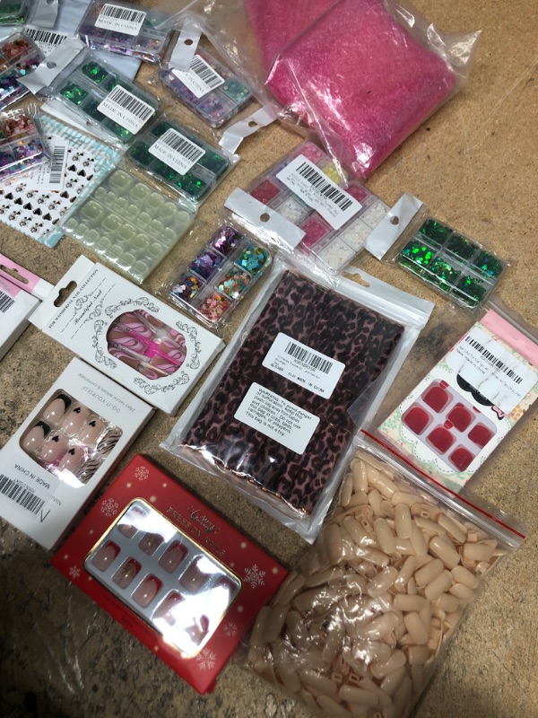 Photo 1 of Bundle of 26 fake nails/nail art items