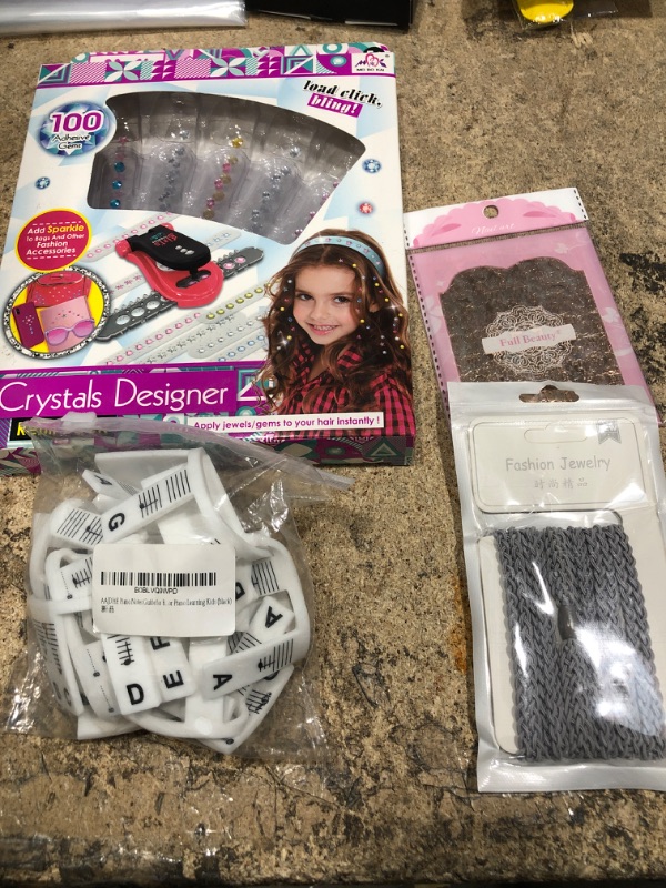 Photo 1 of 4 ITEMS ASSORTED KID JEWELRY/PIANO NOTE GUIDES FOR KIDS BUNDLE 