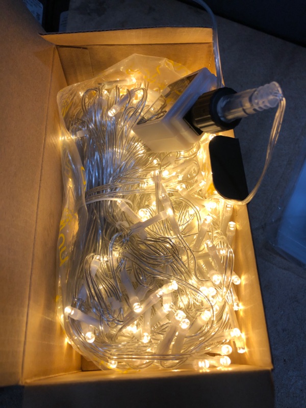 Photo 1 of ***POWERS ON*** Ollny Icicle Christmas Lights Outdoor, Icicle Lights 594LED 49ft Connectable Hanging Fairy String Lights with 99 Drops, 8 Modes Remote Clear Wire Curtain Ice Lights Indoor Decorations (Warm White) Warm White 594LED