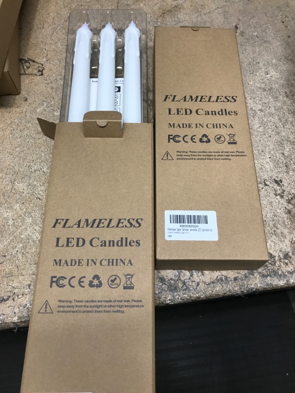 Photo 2 of  2 pack* Flameless Taper Candles Battery Operated Led Taper Candles Flickering Flame With Remote Electric Window Candles Christmas Home Wedding Decor Flameless LED Candlesticks 3 Pack 11 Inch White Real Wax