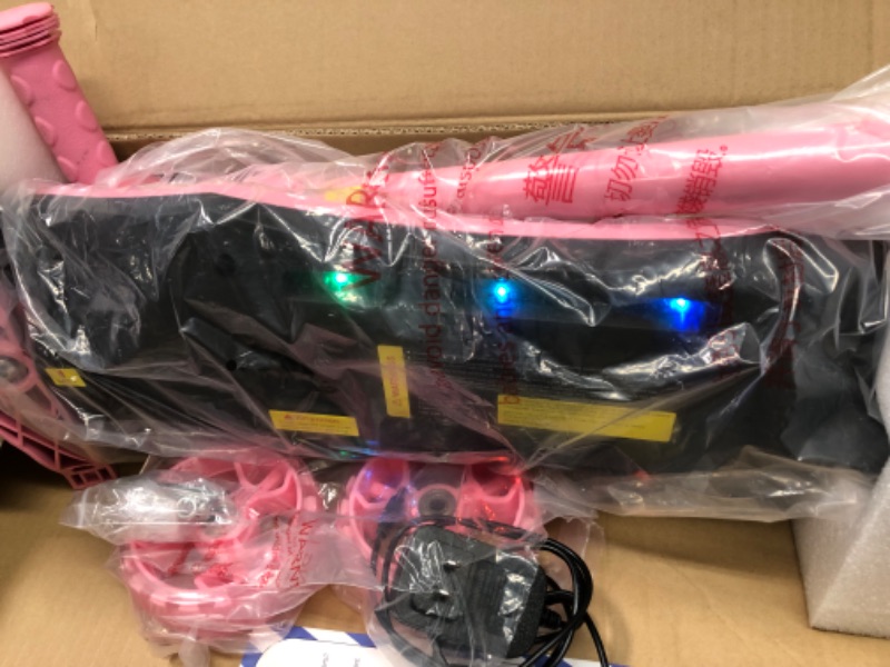 Photo 1 of *** USED *** ** TESTED POWERD ON UNKNOWN FUNCTION *** isinwheel Mini Electric Scooter for Kids Ages 3-12, 3-Wheel Electric Scooter for Toddler Boys/Girls, Electric Kick Scooter for Kids with Long Battery Life, Flashing LED Wheels, 3 Adjustable Height pink