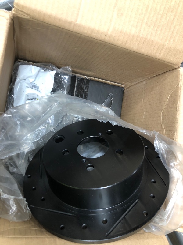 Photo 1 of Drilled and Slotted Black Zinc Brake Rotor 633-13025L