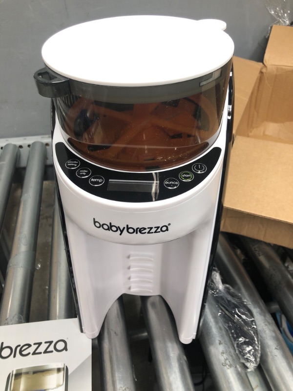 Photo 1 of *** POWERS ON *** New and Improved Baby Brezza Formula Pro Advanced Formula Dispenser Machine - Automatically Mix a Warm Formula Bottle Instantly - Easily Make Bottle with Automatic Powder Blending
