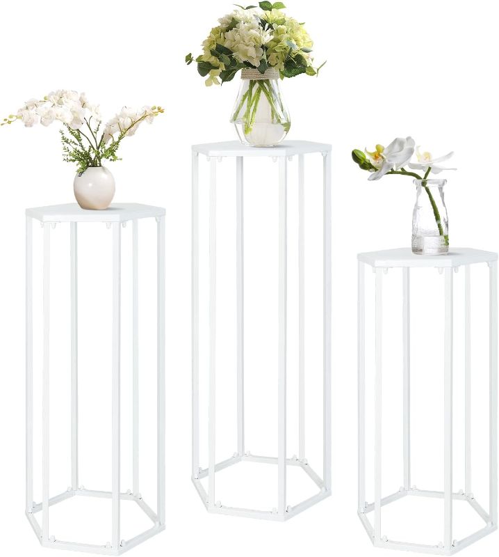 Photo 1 of  **HARDWARE INCOMPLETE**
Plant Stand Indoor Set of 3, Modern Hexagon Tall Plant Stand Outdoor Plant Stand Nesting Metal Plant Stand Flower Pot Shelf Holder for Living Room,Patio, Party, Wedding Decor (hex-white)
