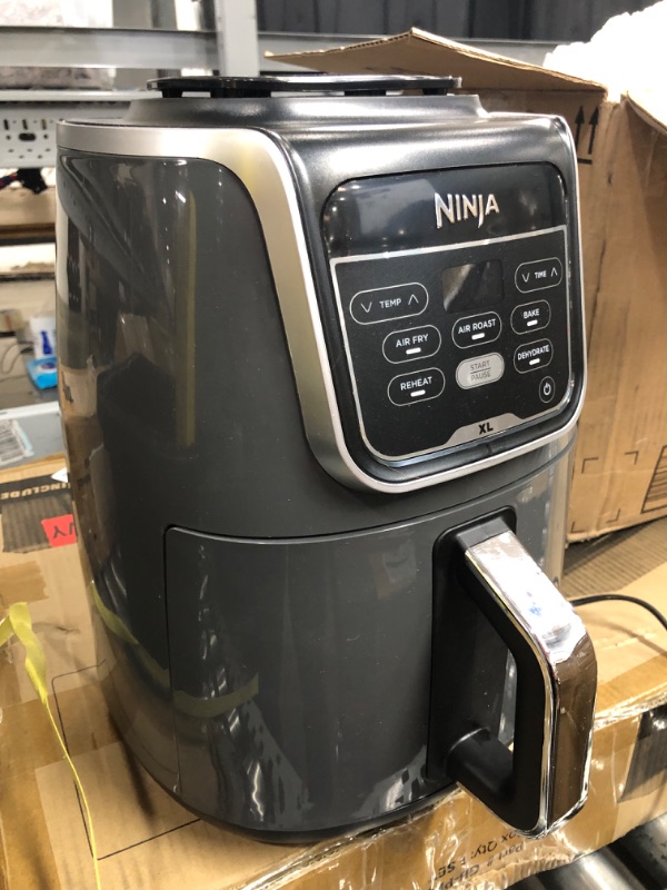 Photo 2 of **MINOR WEAR & TEAR**Ninja AF150AMZ Air Fryer XL, 5.5 Qt. Capacity that can Air Fry, Air Roast, Bake, Reheat & Dehydrate, with Dishwasher Safe, Nonstick Basket & Crisper Plate and a Chef-Inspired Recipe Guide, Grey
