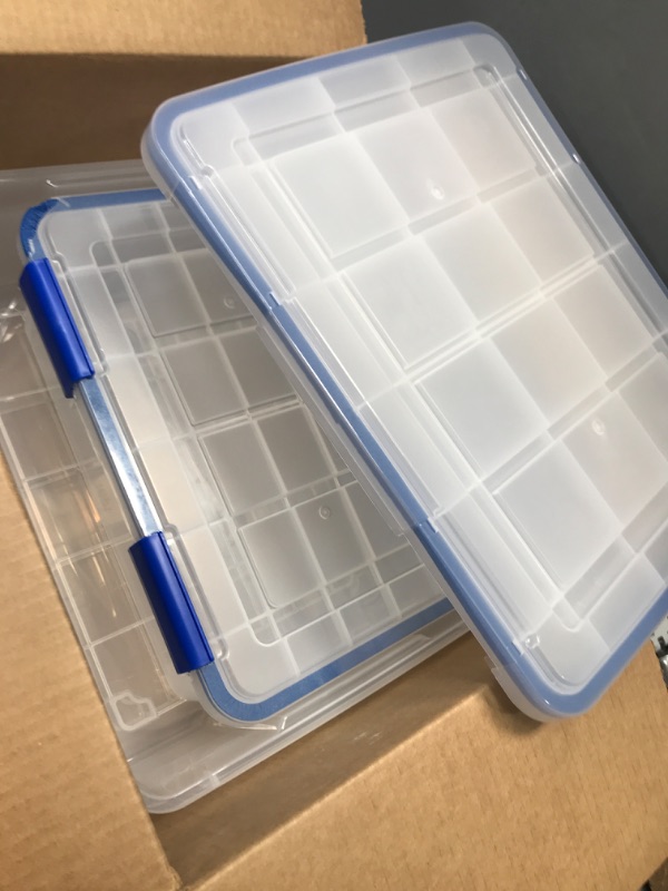 Photo 2 of *READ NOTES*IRIS USA 26.5 Quart WEATHERPRO Plastic Storage Box with Durable Lid and Seal and Secure Latching Buckles, Clear With Blue Buckles, Weathertight, 3 Pack 26.5 Quart - 3 Pack