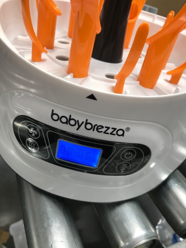 Photo 2 of Baby Brezza Baby Bottle Sterilizer and Dryer Machine – Electric Steam Sterilization - Universal Fit - Pacifiers, Glass, Plastic, and Newborn Feeding Bottles