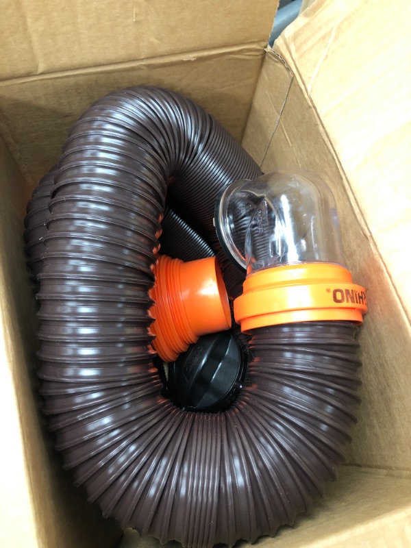 Photo 2 of Camco RhinoFLEX RV Sewer Hose Kit with Swivel Transparent Elbow and 4-in-1 Dump Station Fitting, Brown, 15 Feet (39770) 15ft Sewer Hose Kit Frustration-Free Packaging