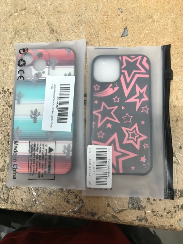 Photo 1 of *BUNDLE OF 2 PHONE CASES* 