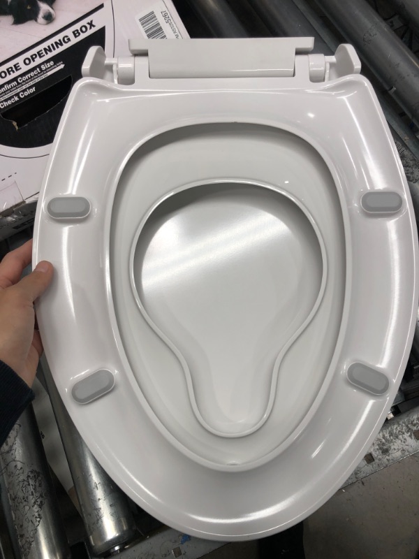Photo 5 of **DAMAGE**
Elongated Toilet Seat with Toddler Seat Built In, Slow Close, Quick Release, Never Loosen, Heavy Duty, White
(18 5/8"x14 3/16")