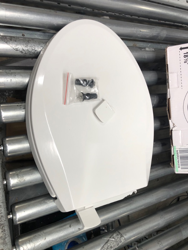 Photo 2 of **DAMAGE**
Elongated Toilet Seat with Toddler Seat Built In, Slow Close, Quick Release, Never Loosen, Heavy Duty, White
(18 5/8"x14 3/16")