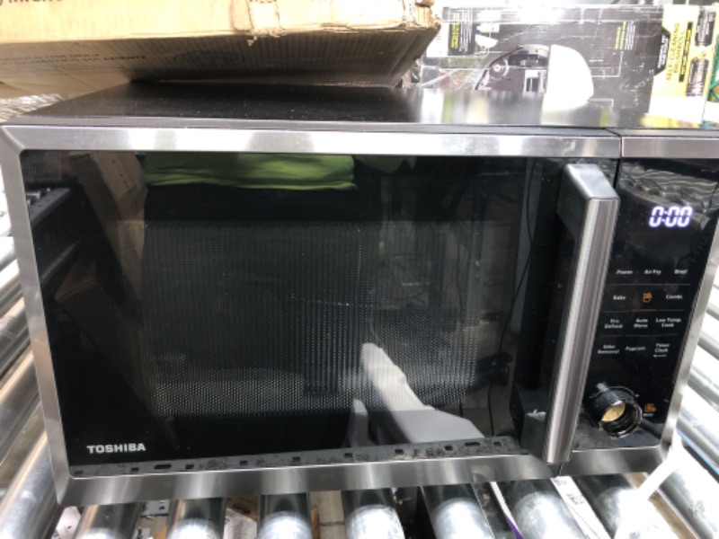 Photo 2 of **USED**
TOSHIBA ML2-EC10SA(BS) 8-in-1 Countertop Microwave with Air Fryer Microwave Combo, Convection, Broil, Odor removal, Mute Function, 12.4" Position Memory Turntable with 1.0 Cu.ft, Black stainless steel Air Fry-1.0 Cu.Ft.