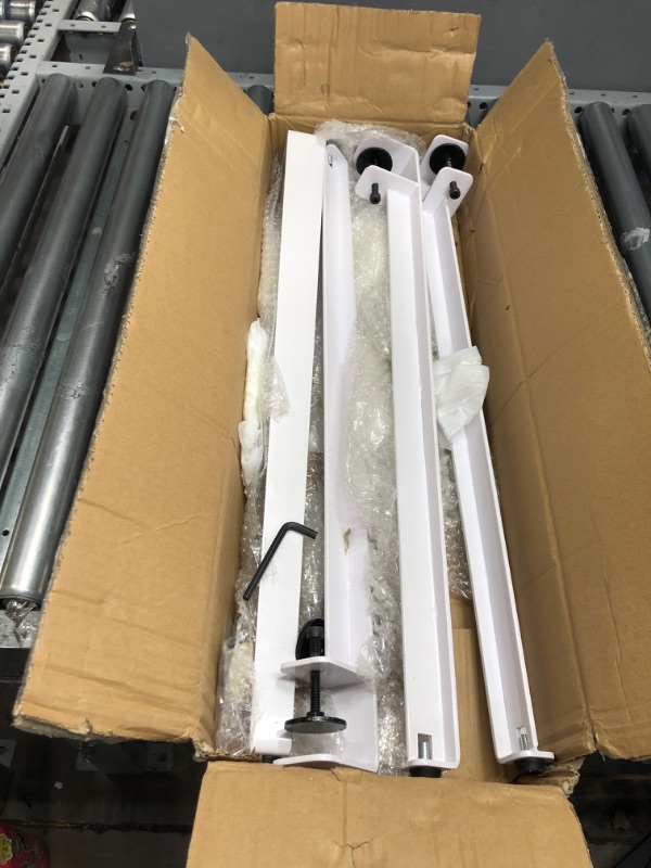 Photo 1 of 4 Metal bars with screws