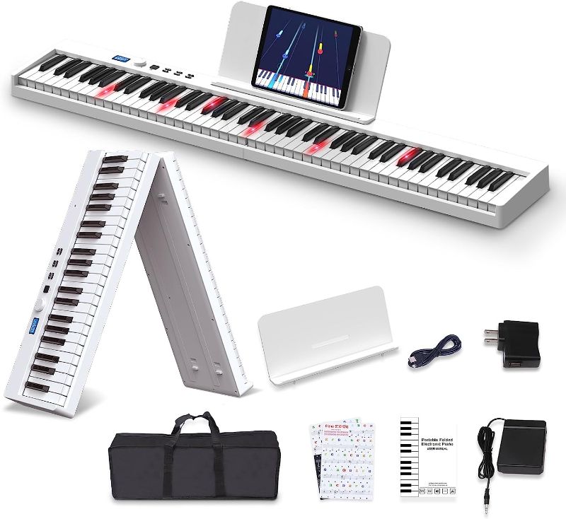 Photo 1 of KONIX Folding Piano Keyboard, 88 Keys Full Size Semi-Weighted Foldable Piano, Portable Electronic Keyboard Piano with Light Up Keys, Sustain Pedal, Keyboard Stickers, Music Stand and Piano Bag, White

