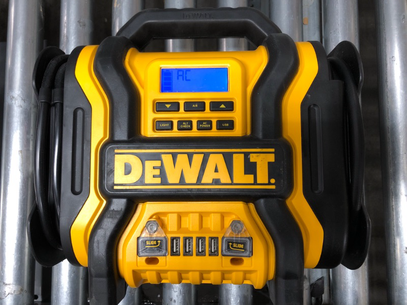 Photo 1 of DEWALT DXAEPS14 1600 Peak Battery Amp 12V Automotive Jump Starter/Power Station with 500 Watt AC Power Inverter, 120 PSI Digital Compressor, and USB Power , Yellow
